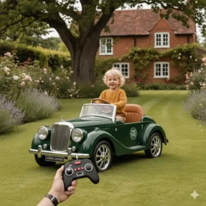 A red toddlers' ride-on car with parental remote control driving smoothly across a manicured lawn.