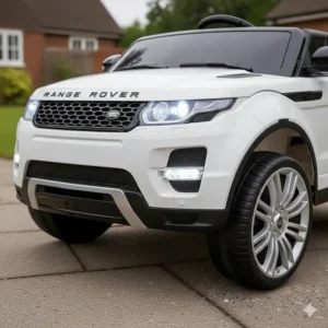 Front view of a Range Rover ride-on car showing the bright, functional LED headlights and signature grille.