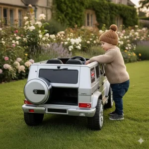 A child opening the rear boot storage compartment of a luxury ride on electric vehicle.