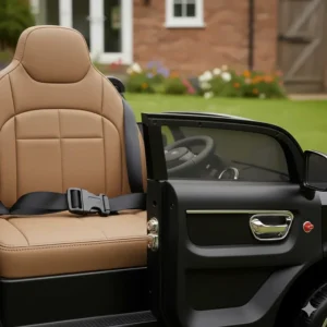 Detail shot of an adjustable lap safety belt inside a battery-powered ride on car with functional doors.