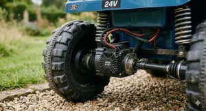 Close-up of the four-wheel drive motors on a 24V buggy for children, highlighting traction for grass and uneven terrain.
