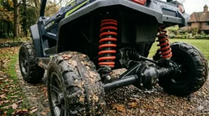 Detailed view of the heavy-duty rear coil suspension on a 24v off-road buggy for better handling on rough ground.