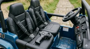 View of the two-seater cabin featuring adjustable safety belts and the 2.4G parental remote control unit for added security.