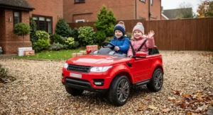 Large two-seater ride-on car Christmas gift suitable for siblings to share in the garden.