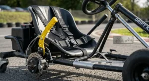 Detailed view of the safety features on an adjustable drift kart, including the lap belt and responsive handbrake system.