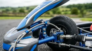 A British rider wearing a CE-marked safety helmet and pads while operating an electric drift kart.