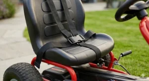 Diagram showing the adjustable bucket seat and secure three-point safety harness on a 12V go kart.