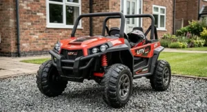 A vibrant red 4x4 UTV for kids parked on a gravel driveway, showcasing the high-gloss paint finish.