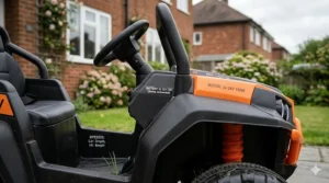 Close-up of a secure 3-point safety harness on a ride-on buggy for older children.