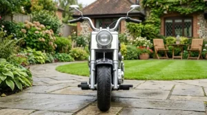 Front view of the 12v cruiser-style electric motorcycle for kids, highlighting the realistic headlight design.