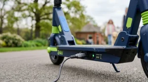 Close-up of adjustable handlebars on a 24v electric scooter for growing children.