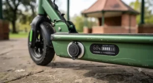 Charging port and battery status display showing the charge level on a 36v electric scooter.