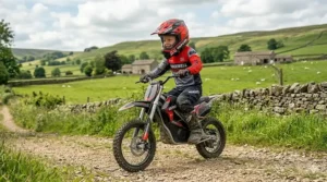 Child wearing a helmet and pads while riding an electric motorbike