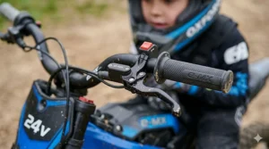 A child wearing a safety helmet and pads riding a 24v electric dirt bike.