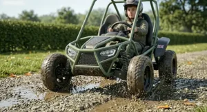 A powerful 24V 4WD off-roader vehicle navigating a gravel driveway.