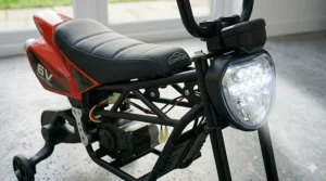 Realistic LED headlight illuminated on the electric motorbike.