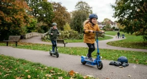 A child enjoying their 24v electric scooter on a private garden path.