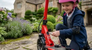 A parent plugging the charger into a 36v electric scooter battery port.
