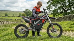 A child easily manoeuvring a lightweight electric motorbike in a park