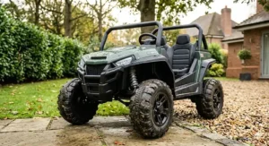 Close-up of 12V electric off-road buggy featuring durable treaded tyres for garden paths.