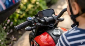 Close-up of safety features on an electric motorbike for a 2 year old, including stabilisers.