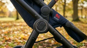 Close-up of safety compliance labels on a pushchair, confirming it meets British standards, a vital safety feature to look for in a kids buggy.