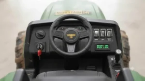 Comfortable leather-style seat inside the 24v ride on tractor cab.