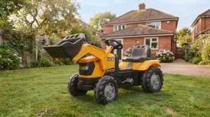 Fully assembled JCB ride-on tractor shown from a side angle, ready for outdoor adventure and imaginative play.