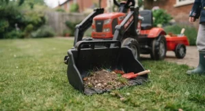 Action shot of a child using the front-loader bucket attachment on a multi-function ride-on tractor.