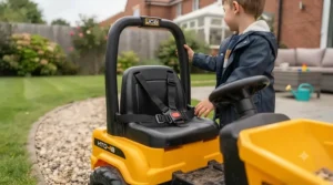 Rear view of a sturdy JCB ride-on dumper featuring an ergonomic seat and stability guards for safe garden play.