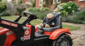 Safety features highlighted on the multi-function ride-on tractor, including the seatbelt and stable wheel design.