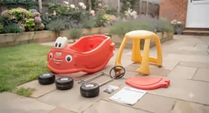 Self-assembly components and parts layout for setting up a new licensed character Cozy Coupe toy.