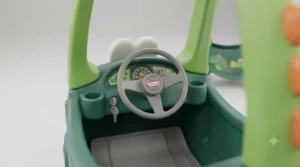 Close-up of the Cozy Coupe Dino interior featuring the steering wheel, ignition switch, and pretend dashboard.