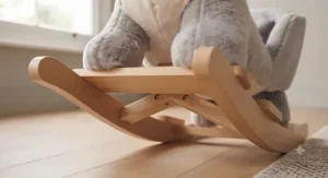 Detailed view of interactive features like crinkle ears and sound buttons on a rocking animal ride-on.