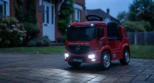 Bright LED headlights switched on during dusk for an electric truck ride-on toy
