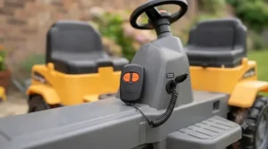 Parental remote control safety feature on an electric ride on dumper truck