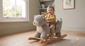 A one-year-old toddler safely sitting and playing on a plush rocking animal designed for early years development.