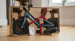 Unboxed metal balance bike with an adjustable seat, ready for a child's birthday or Christmas present