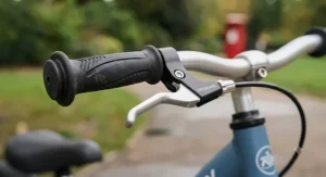 Ergonomic handlebars with safety grips on an adjustable metal balance bike
